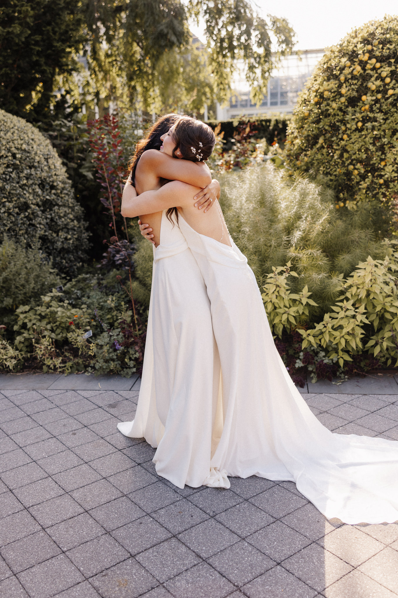 Couple sharing an emotional first look embrace, documentary wedding photographer Honey & Bloom Photography Central New York